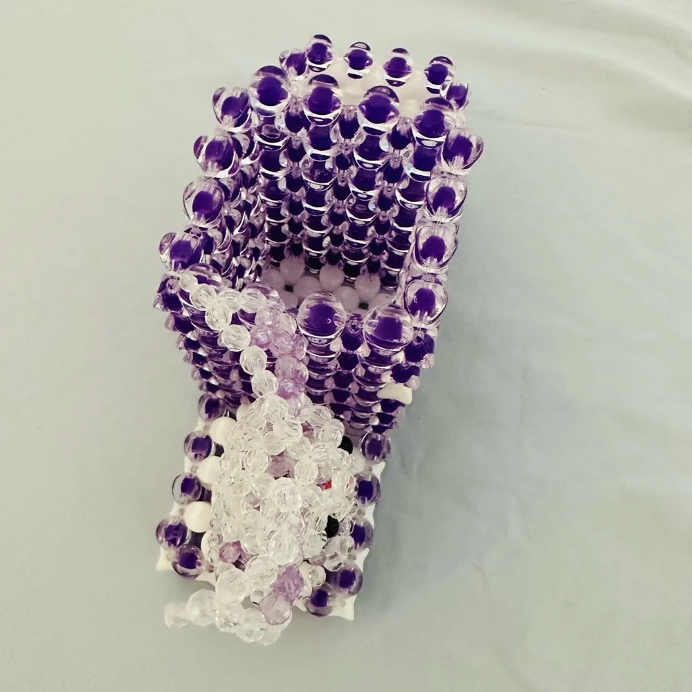 A cute little bunny pencil holder handmade beads in shades